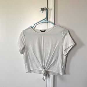 Cropped white shirt tie front